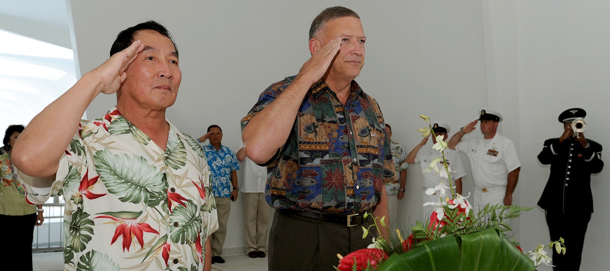 Air Chief Marshal Itthaporn Subhawong, Commander-in-Chief of the Royal Thai Air Force, and General Gary North, Pacific Air Forces commander, salute during a special wreath laying ceremony during the playing of taps at the Arizona Memorial site near Joint Base Pearl Harbor-Hickam, Hawaii, Sept. 8.  Air Chief Marshal Itthaporn visited Hawaii to meet with General North and senior leaders of PACAF to discuss common concerns and explore opportunities to strengthen regional cooperation. (U.S. Air Force photo/Tech. Sgt. Jerome S. Tayborn (Released)) 