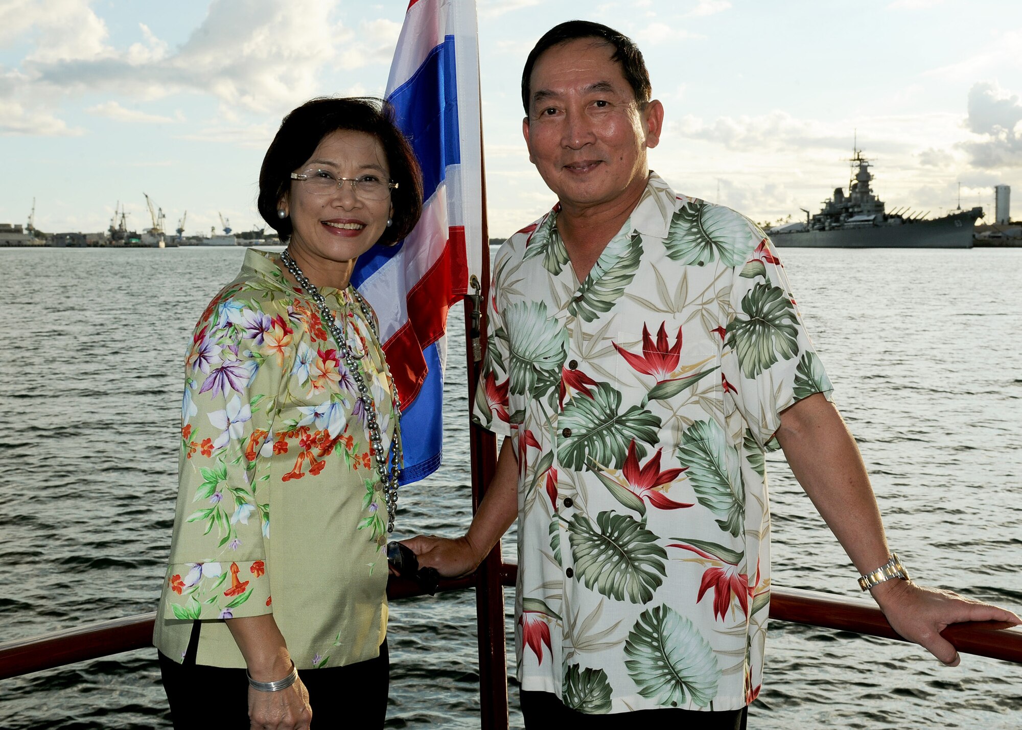 Mrs. Napaporn Subhawong (left), and Air Chief Marshal Itthaporn Subhawong, Commander-in-Chief of the Royal Thai Air Force, pose on the bow of the Pacific Fleet commander’s boat during a special barge tour of Arizona Memorial, near Ford Island, Hawaii, Sept. 8.  Air Chief Marshal Itthaporn visited Hawaii to meet with General North and senior leaders of PACAF to discuss common concerns and explore opportunities to strengthen regional cooperation. (U.S. Air Force photo/Tech. Sgt. Jerome S. Tayborn (Released))