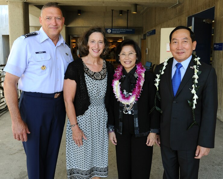 General Gary North, Pacific Air Forces commander, and spouse Mrs. Shelley North (left), pose for a group photo with Air Chief Marshal Itthaporn Subhawong, Commander-in-Chief of the Royal Thai Air Force, and spouse Mrs. Napaporn Subhawong (right), following the Thai air chief’s arrival to Honolulu International Airport, near Joint Base Pearl Harbor-Hickam, Hawaii, Sept. 7.  Air Chief Marshal Itthaporn visited Hawaii to meet with General North and senior leaders of PACAF to discuss common concerns and explore opportunities to strengthen regional cooperation. (U.S. Air Force photo/Tech. Sgt. Jerome S. Tayborn (Released))