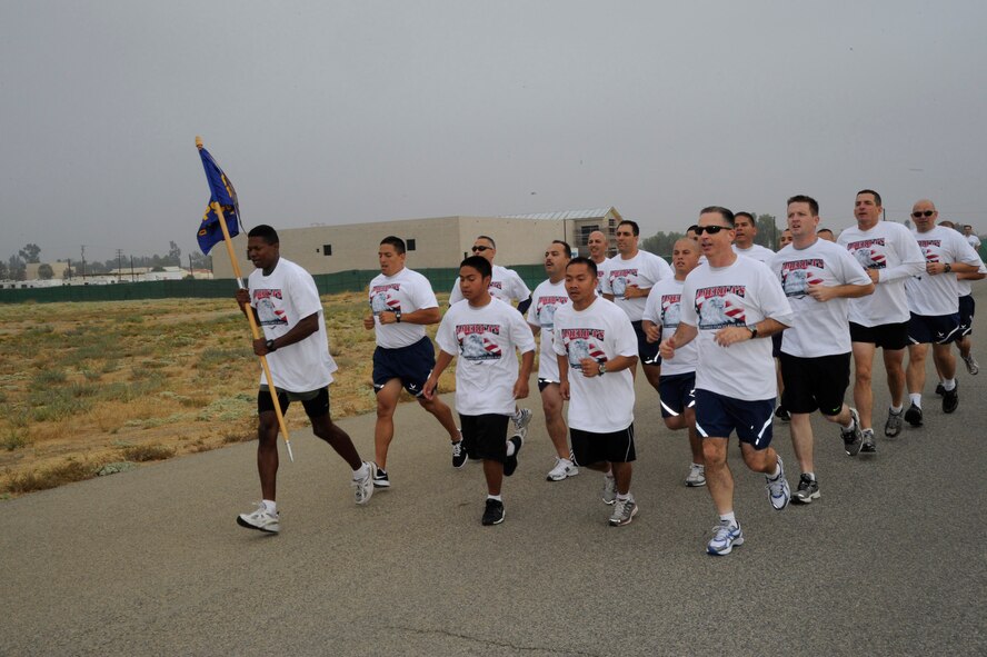 Several 452nd Air Mobility Wing squadrons competed in formation at the 9/11 Remembrance 5K run and walk at March Air Reserve Base, Calif., Sept. 10, 2011.  The First Sergeant's Council and the March Fitness Center co-hosted the run.  (U.S. Air Force photo/ Master Sgt. Roy Santana)