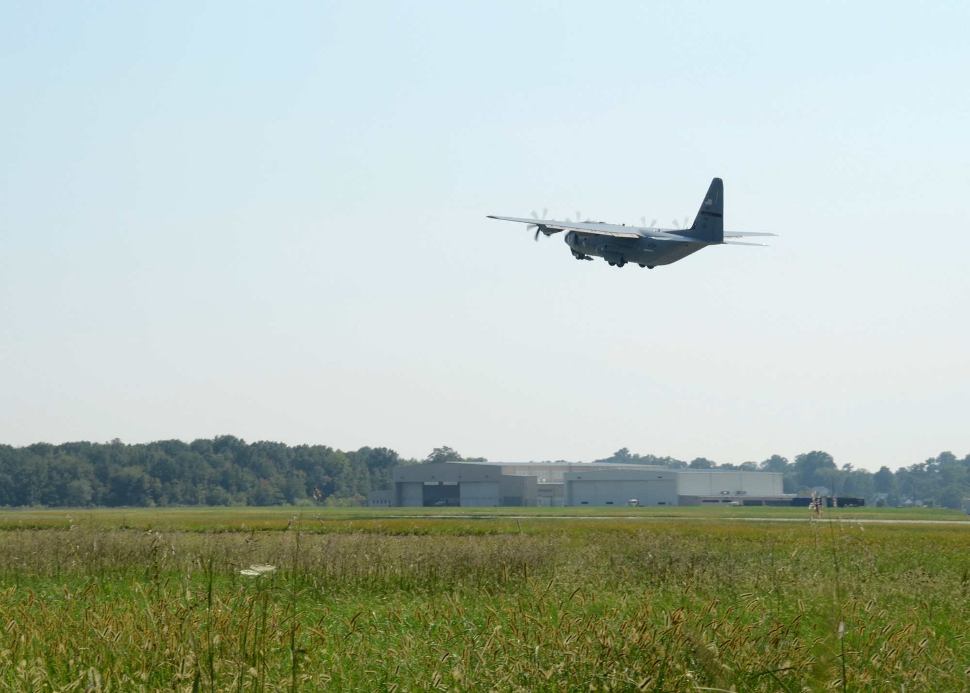 C-130J Hercules takes off from Warfield Air National Guard Base, Baltimore, MD for the last time as a part of the Maryland Air National Guard on September 13, 2011. The last C-130J Hercules to leave the 175th Wing was also the same aircraft that was first to arrive in 1999. (U.S. Air Force photo by Staff Sgt. Benjamin Hughes/RELEASED) 