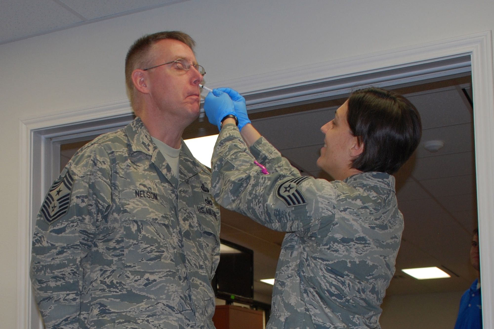 Chief Master Sgt. David Nelson, 82nd Training Wing command chief, receives his annual flu vaccination Sept. 14, Sheppard Air Force Base, Texas. Flu vaccinations will be available for all active duty, dependents and retirees at the Sheppard Immunization Clinic beginning Sept. 19. 