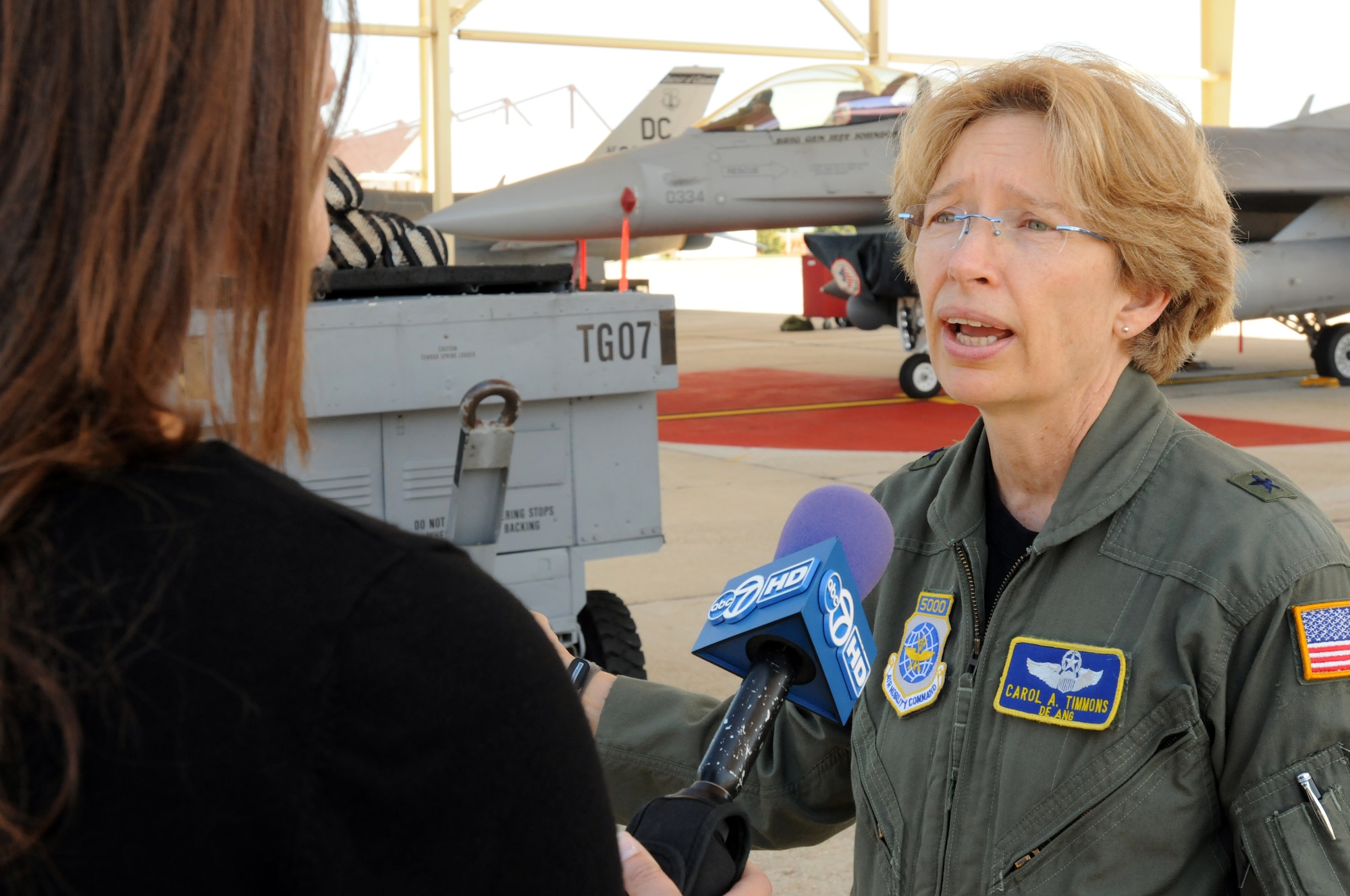 Air Force Brig. Gen. Carol A. Timmons, director of the Delaware National Guard joint staff, talks to local media at a National Guard 9/11 media day event Aug. 30, 2011, at Joint-Base Andrews in Maryland. Timmons, who is also a commercial airline pilot, was aboard a fifth plane that some believe was to be hijacked on Sept. 11, 2001, before air traffic controllers grounded all aircraft at Kennedy International Airport. (U.S. Army photo by Sgt. Darron Salzer)(Released)