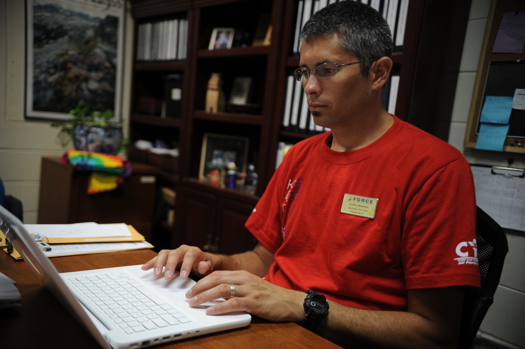 Geoffrey Rhinehart, Kadena Youth Center director, makes plans for youth programs at the center on Kadena Air Base, Japan, Sept. 8. One of Rhinehart's primary goals has been to capitalize on local resources and encourage Kadena’s youth to go outside, be active and venture out of their comfort zones.  (U.S. Air Force photo/Staff Sgt. Christopher Hummel)