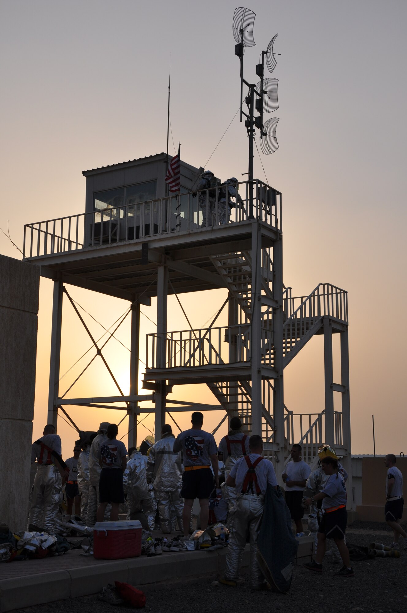 Twenty-one firefighters and fellow volunteer servicemembers participate in the “Climb to Remember” Sept. 11 at an undisclosed location in Southwest Asia. (U.S. Air Force phot by Senior Airman Rachelle Elsea)