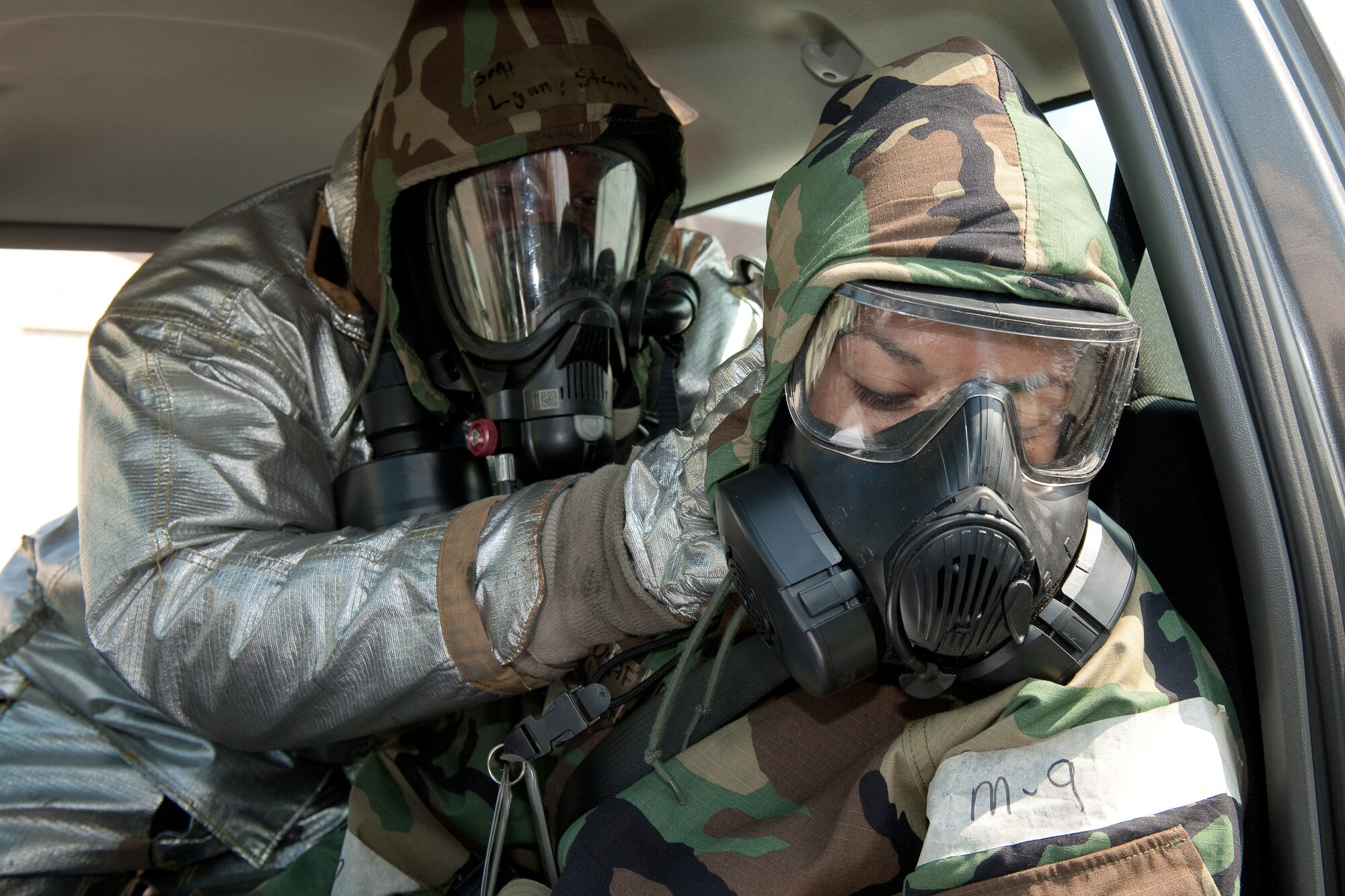 YOKOTA AIR BASE, Japan -- Senior Airman Stanley Lynn, 374th Civil Engineer Squadron, performs immobilization procedures at a simulated contaminated environment at Yokota Air Base, Japan, Sept. 14, 2011 during a wing readiness exercise. (U.S. Air Force photo/Osakabe Yasuo)
