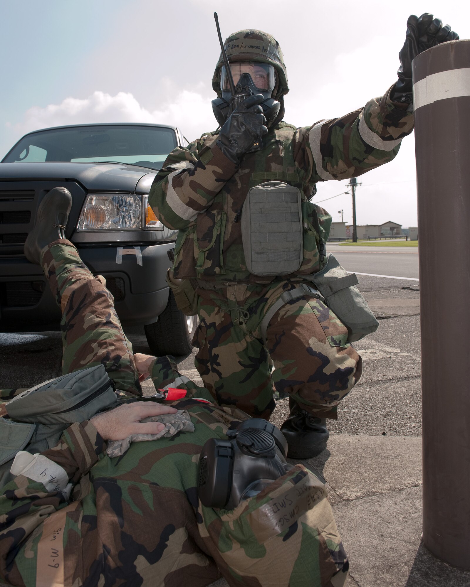 YOKOTA AIR BASE, Japan -- Airman Alexander Archer, 374th Communications Squadron, reports finding a simulated injured person to the security forces control center at Yokota Air Base, Japan, Sept. 14, 2011 during a wing readiness exercise. (U.S. Air Force photo/Osakabe Yasuo)