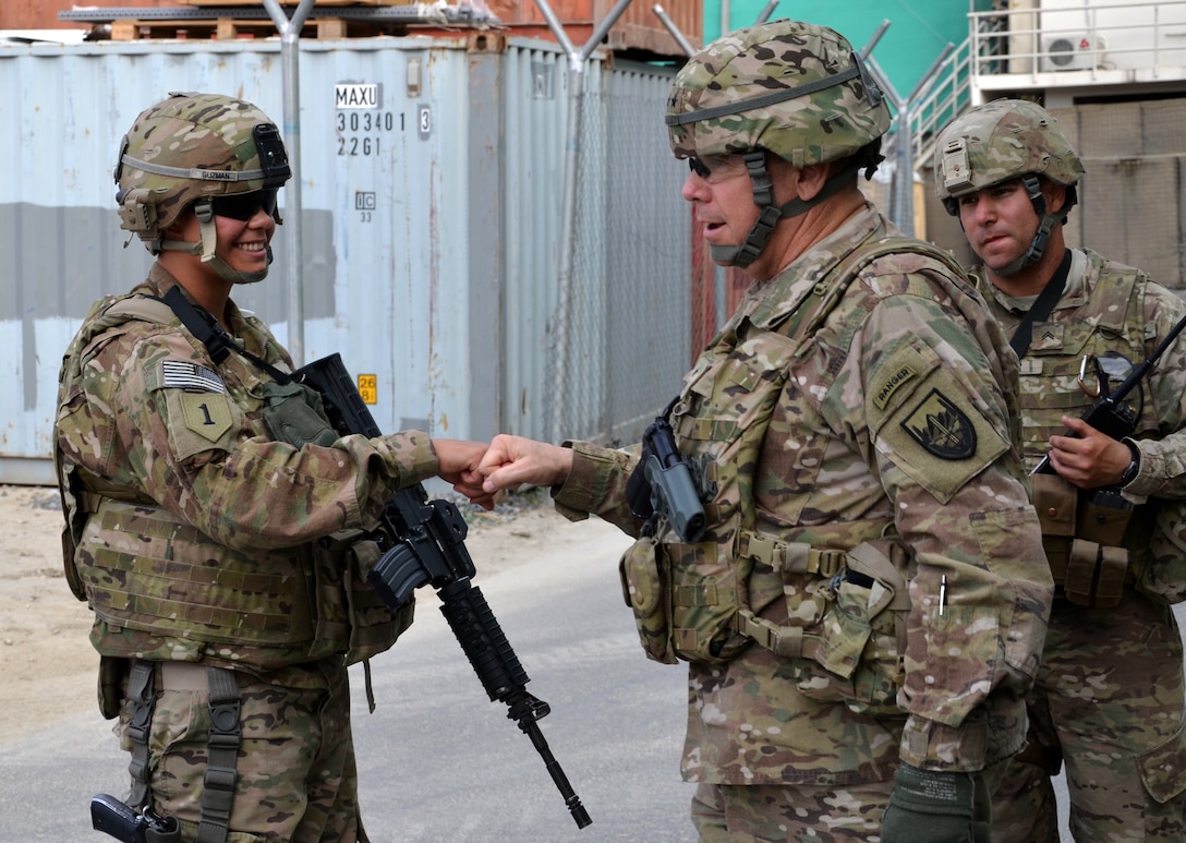 U.S. Army Maj. Gen. Timothy McHale gives encouragement to troops maintaining security and returning fire during an attack in Kabul, Afghanistan, Sept. 13, 2011. McHale is assigned to U.S. Forces Afghanistan deputy commander for support.