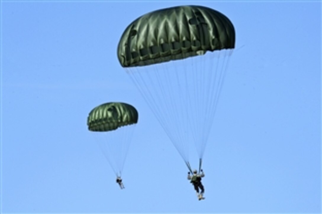 Army paratroopers make a static line jump over Edwards Air Force Base about 100 miles north of Los Angeles, Sept. 11, 2011. The paratroopers began the operation from March Air Reserve Base in Riverside County, Calif., Sept. 11, 2011.