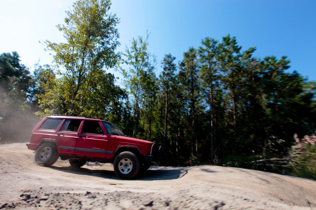 Marines with Special Purpose Marine Air Ground Task Force 2012 negotiate an off-road course during an advanced tactical driver course at U.S. Training Center here Sept. 13 ahead of a deployment in support of U.S. Africa Command.