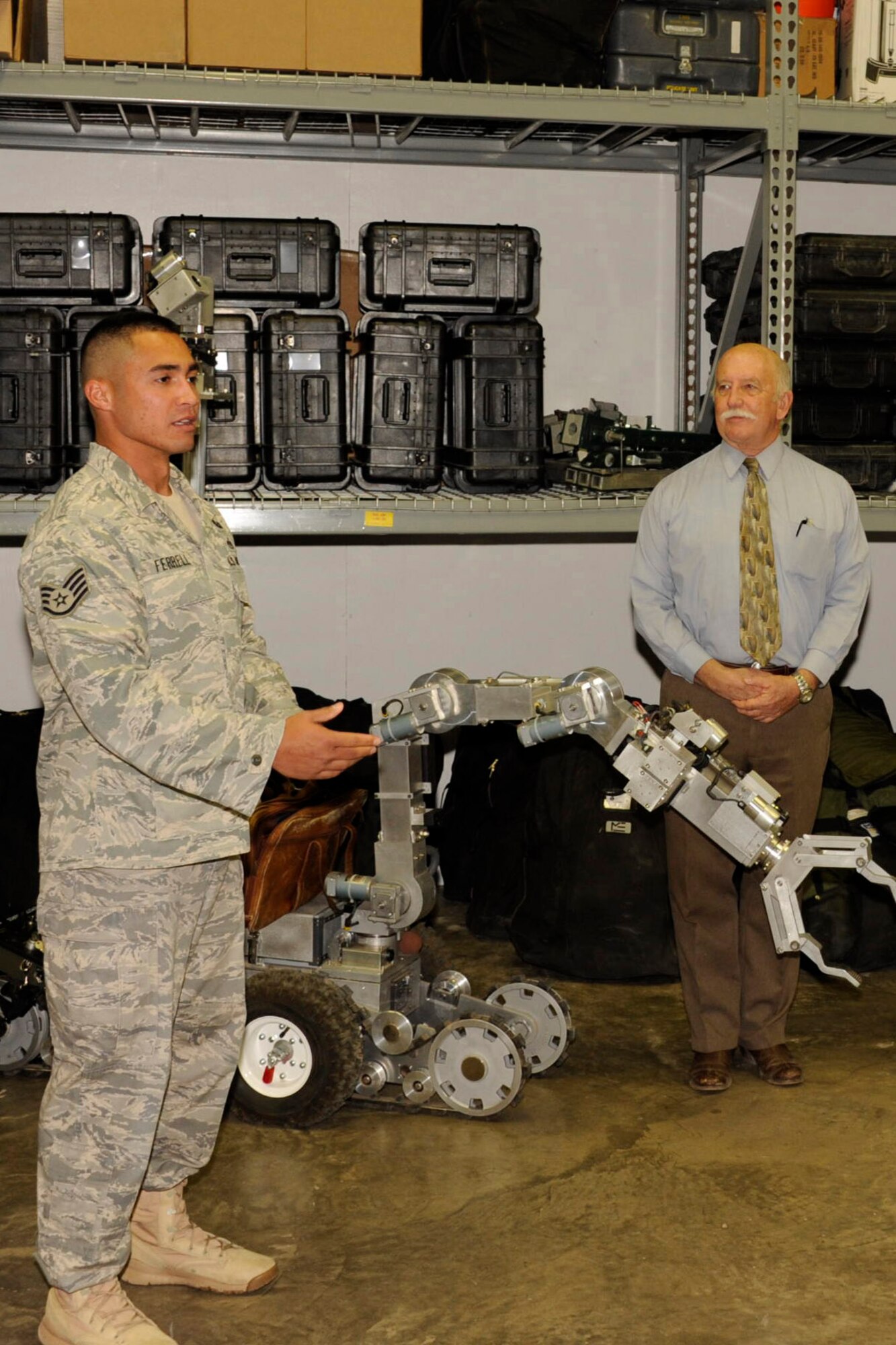 Staff Sgt. Christopher Ferrell, 366th Training Squadron Detachment 3, expresses his gratitude after receiving the Air Force Association "Best in Texas" award from Dr. Mike Winslow, president of the General Charles L. Donnelly Chapter, at Sheppard Air Force Base Sept. 15, 2011. Sergeant Ferrell was recognized for his excellence in duty performance, self improvement and personal achievements.