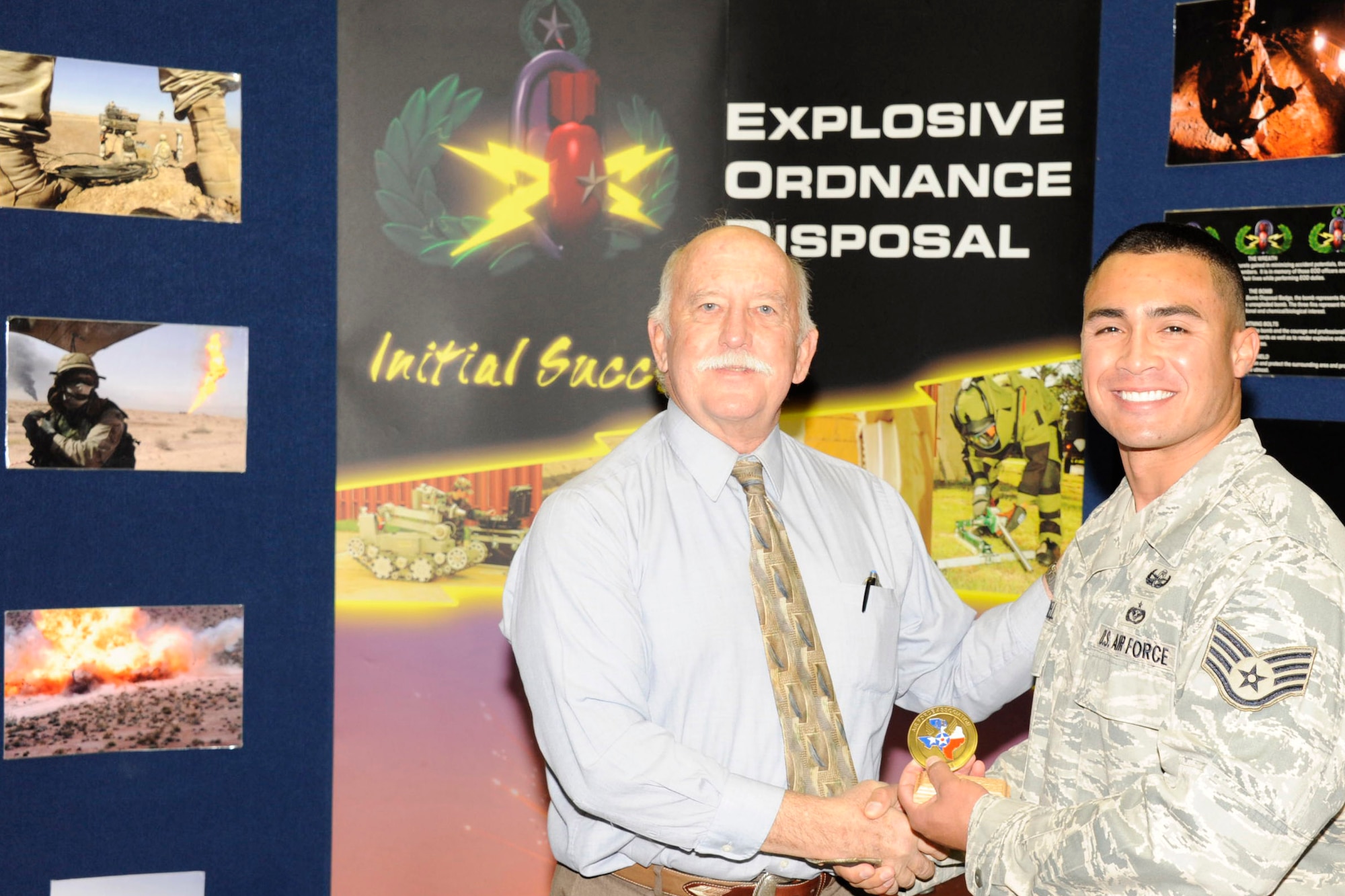 Staff Sgt. Christopher Ferrell, 366th Training Squadron Detachment 3, receives the Air Force Association "Best in Texas" award from Dr. Mike Winslow, president of the General Charles L. Donnelly Chapter, at Sheppard Air Force Base Sept. 15, 2011. Sergeant Ferrell was recognized for his excellence in duty performance, self improvement and personal achievements.