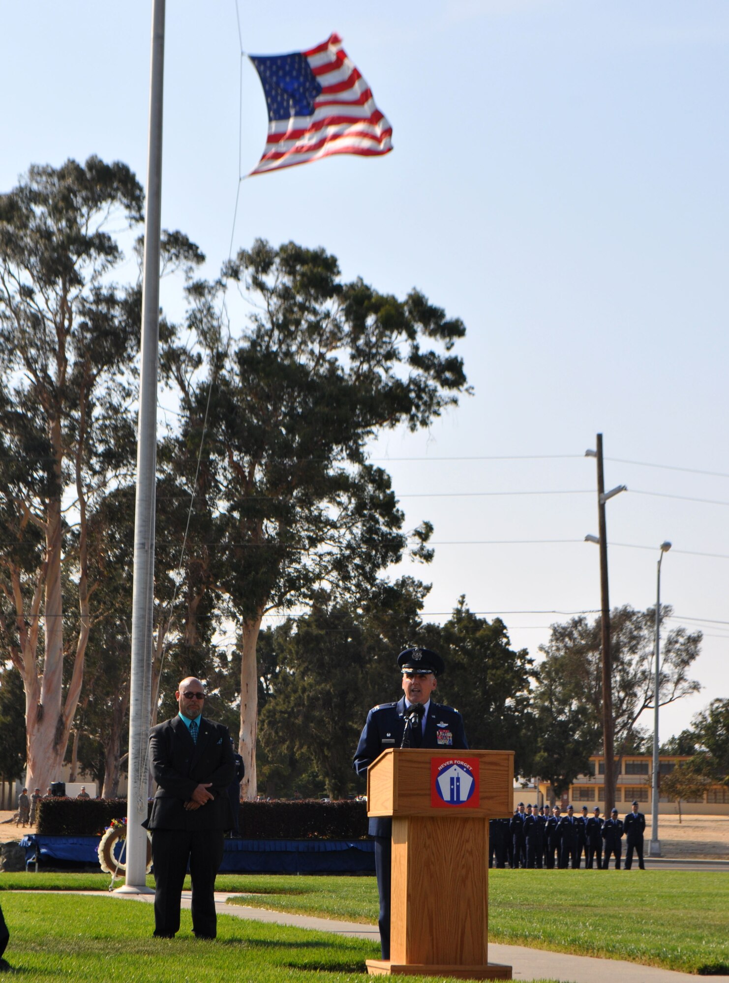 Col. Jay Flournoy speaks to a crowd of more than 400 Travis family, friends and retirees, at the 10th anniversary 9/11 retreat and remembrance ceremony Sunday. That fateful day in 2001, he was a young major on duty at the Pentagon who heard and felt the concussion when American Airlines Flight 77 crashed into the building, killing all 59 on board and 125 on duty at the Pentagon. "I urge you, as painful as it may be, to do whatever is necessary to ensure that you and your loved ones never forget that September day," he said.