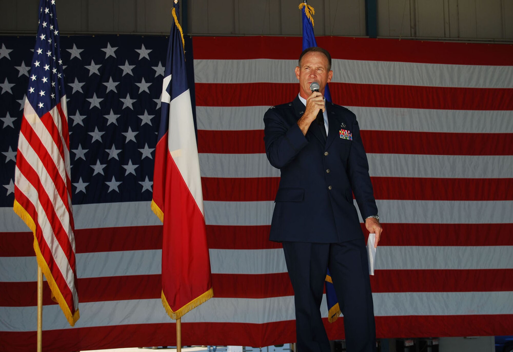 Col. Charles M. Combs, gained command of the 433rd Maintenance Group during and assumption of command ceremony held Sept. 11, 2011, at the 433rd Airlift Wing fuel cell at Lackland Air Force Base, Texas.  During his remarks he called the men and women under his command the best maintenance organization on the planet. (U.S. Air Force Photo/Master Sgt. Collen McGee)