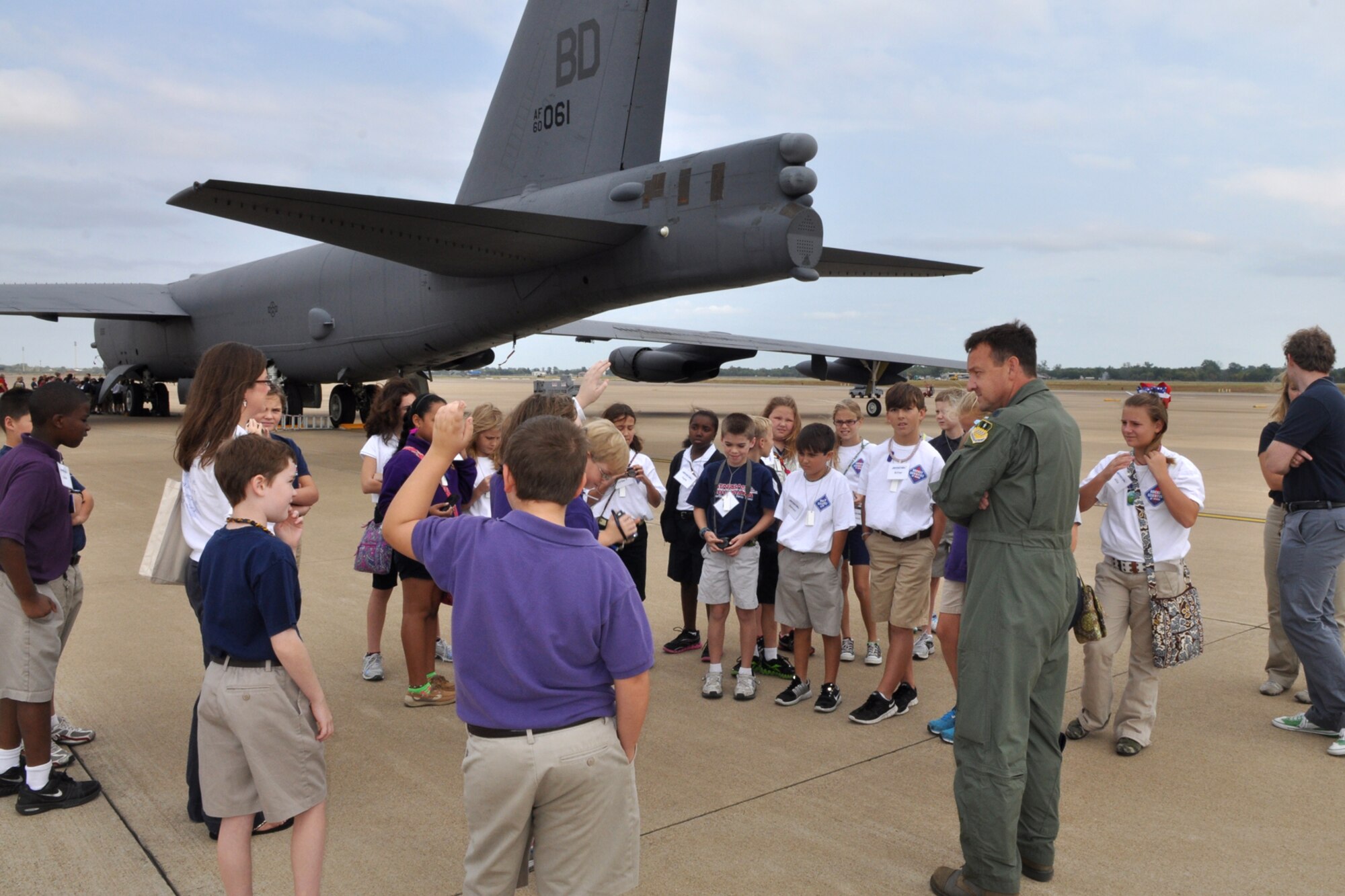 Lt. Col. Todd Callahan, the 11th Bomb Squadron’s director of training, answers questions about the B-52 Stratofortress and its capabilities from a group of Benton Elementary 5th Grade students at Barksdale Air Force Base, La., Sept. 15, 2011. The students are participating in the STARBASE program, which presents an exciting 25-hour hands on/minds on aviation and aerospace curriculum to area 5th grade students and their teachers. (U.S. Air Force photo by Tech. Sgt. Jeff Walston/Released)