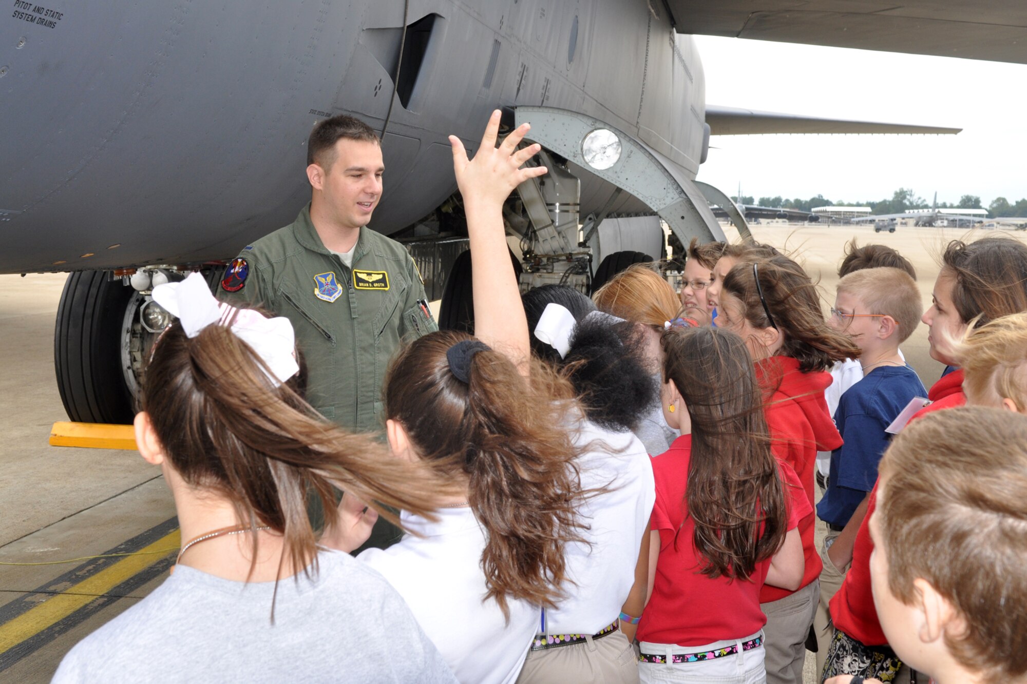 A group of Princeton Elementary 5th Grade students listen as 1st Lt. Brian Groth, a duel seat navigator assigned to the 11th Bomb Squadron, briefs them about the B-52 Stratofortress at Barksdale Air Force Base, La., Sept. 15, 2011. The students are participating in the STARBASE program, which presents an exciting 25-hour hands on/minds on aviation and aerospace curriculum to area 5th grade students and their teachers. The DoD program is committed to addressing the critical needs in STEM education - Science, Technology, Engineering and Mathematics - STARBASE Louisiana introduces its students to exciting STEM education topics, inspiring these young minds to further explore these topics in future course work. (U.S. Air Force photo by Tech. Sgt. Jeff Walston/Released)