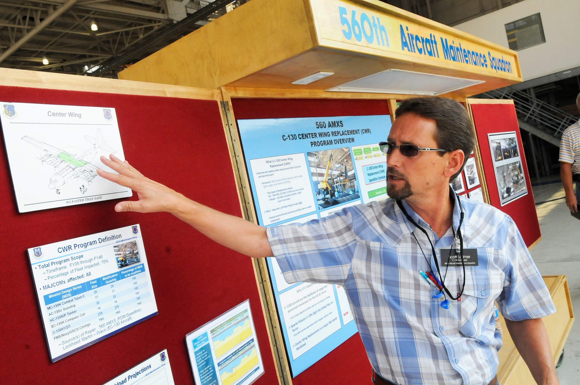 Scott Latimer, 560th Aircraft Maintenance Squadron C-130 team lead, gives an overview of the C-130 center wing box program. U. S. Air Force photo by Sue Sapp