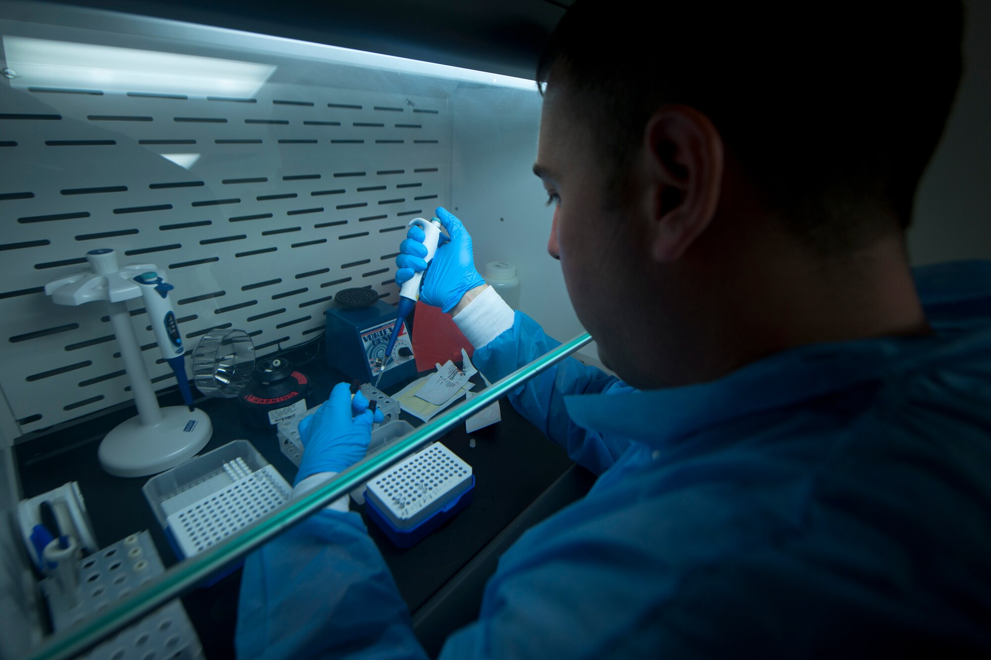 U.S. Air Force 1st Lt. Ryan Garrison, 23rd Medical Group clinical imaging diagnostic flight chief, runs test on a white powdery substance found in a mail room during a training exercise at Moody Air Force Base, Ga., Sept. 14, 2011. After using a checklist to run test on the substance Garrison will run it through a joint biological agent identification and diagnostic system (JBAIDS) to get a preliminary reading of the substance. (U.S. Air Force photo by Airman 1st Class Joshua Green)
