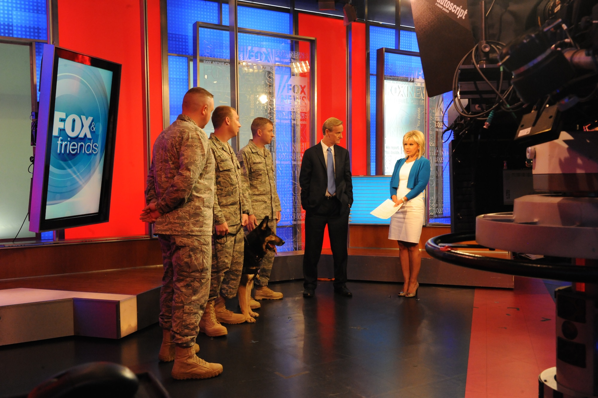 Airmen from the 4th Security Forces Squadron, Seymour Johnson Air Force Base, N.C. speak with Steve Doocy and Gretchen Carlson anchors for FOX and Friends in New York Sept. 12, 2011.  The team of Airmen answered questions about the 2,182 mile march they created to honor the sacrifices made by service members in the decade that has passed since 9/11. (U.S. Air Force photo by 2nd Lieutenant Keavy Rake)