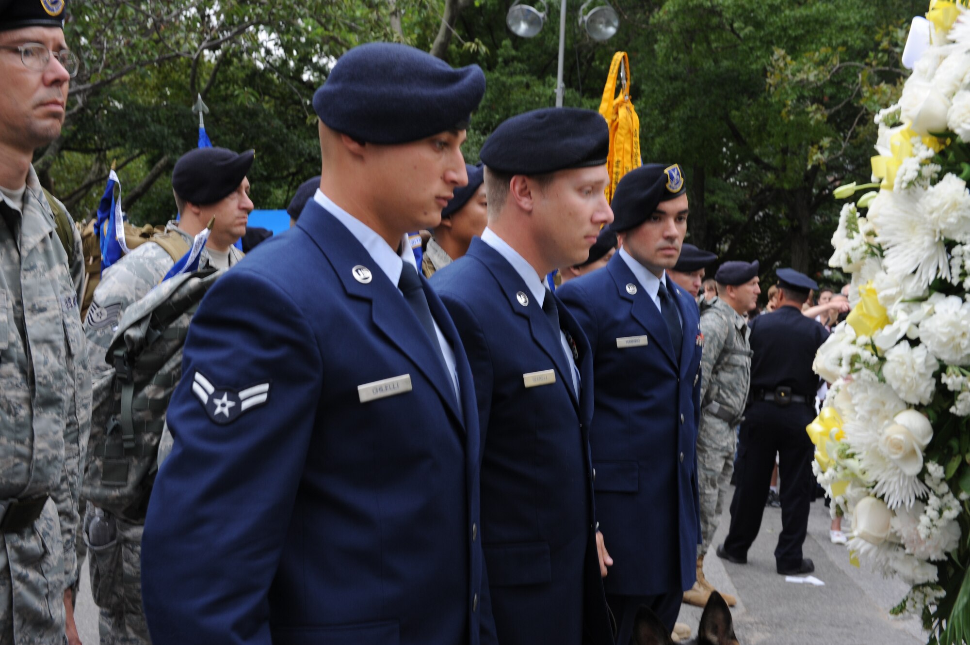Three security forces Airmen complete the wreath laying ceremony at Battery Park, New York Sept.11, 2011.  The wreath laying marked the completion of a 2,182 mile journey from San Antonio to New York. Wreaths were also laid in Shanksville, Pa. and Washington, D.C.  The 2,182 mile march was part of the Security Forces 9/11 Ruck March to Remember.  (U.S. Air Force photo by 2nd Lieutenant Keavy Rake)