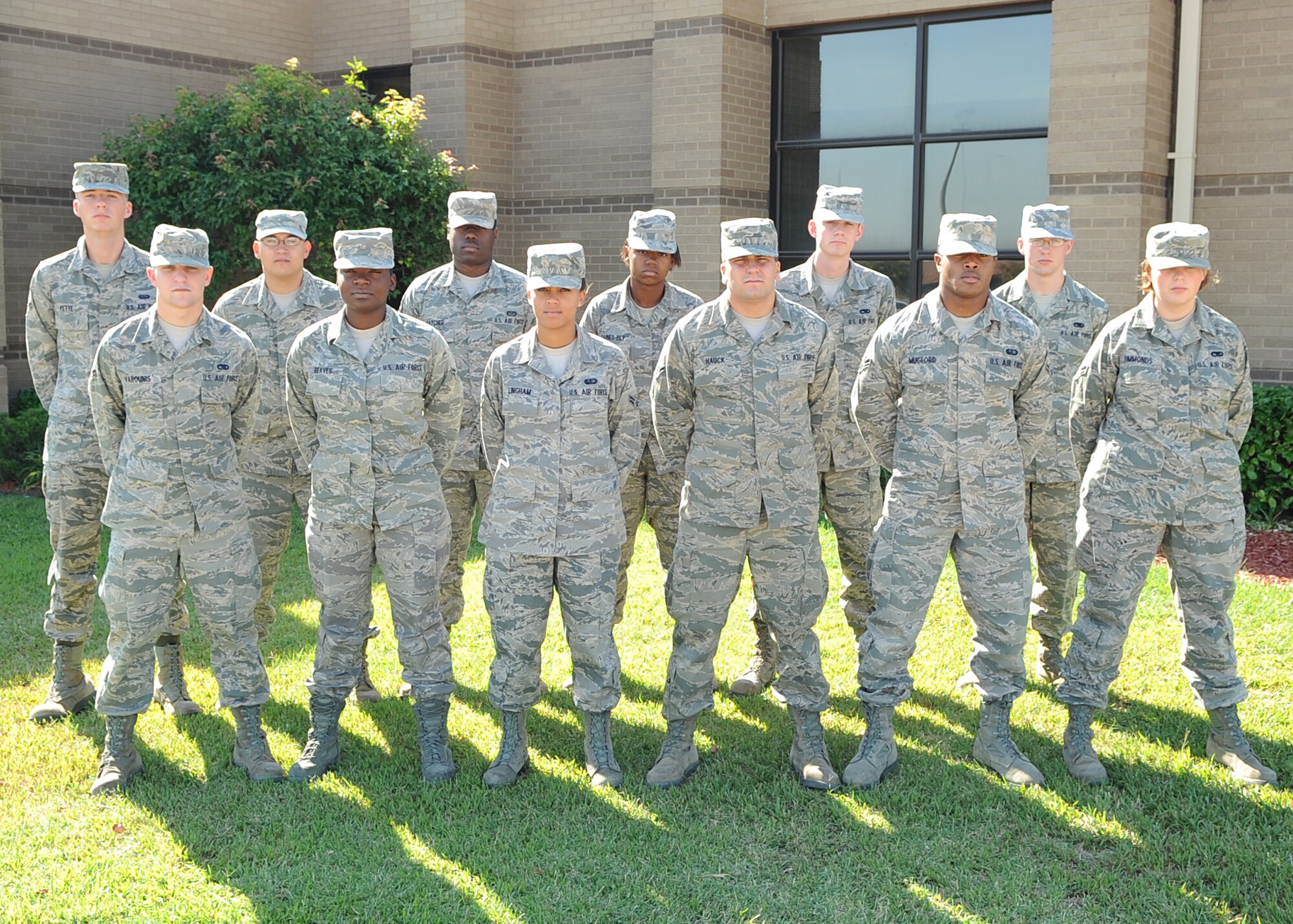 Congratulations to Team McConnell’s First Term Airman’s Center graduates who completed the course Sept. 16, 2011, at McConnell Air Force Base, Kan. Front row: Airmen 1st Class Ryan Varounis, Shakira Reaves, Danielle Lingham, Airman Kyle Hauck, Airmen 1st Class Matthew Mugford and Kailey Simmonds. Second Row: Airmen 1st Class Brent Fette, Robert Loo, Willie Hatcher, Taenecia Gaines-Bey, Patrick Calhoun and Airman Andrew Sivia.  (U.S. Air Force photo by Airman 1st Class Maurice Hodges)