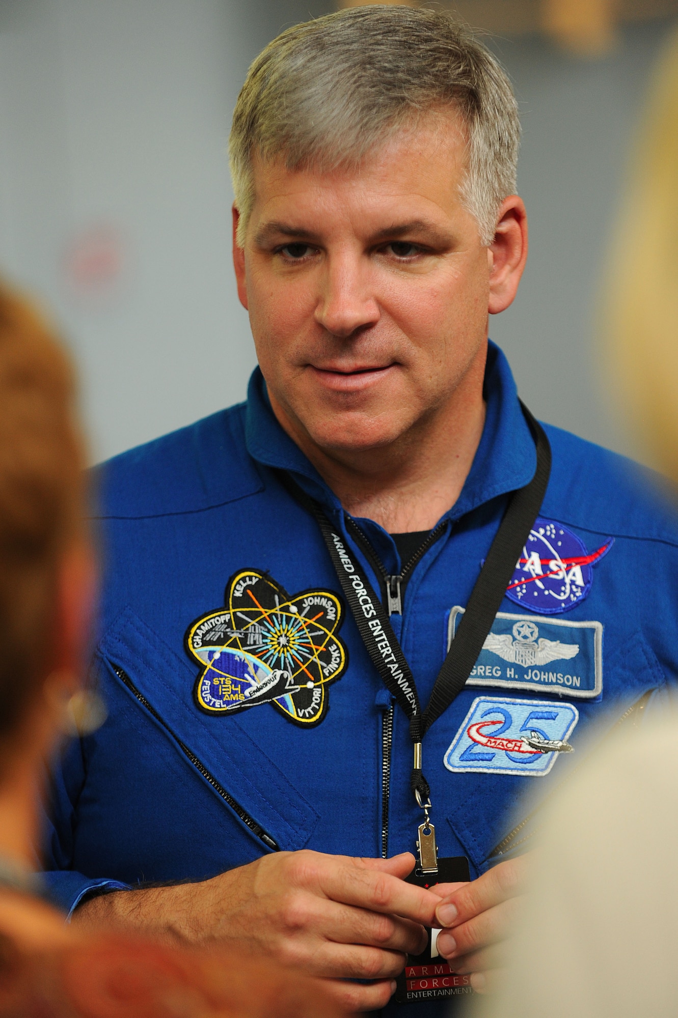 Gregory H. Johnson, NASA Astronaut, answers questions about space travel, Ramstein Intermediate School, Ramstein Air Base, Germany, Sept. 15, 2011. Johnson has logged over 5,000 flight hours in more than 50 different aircraft and has flown two shuttle missions. (U.S. Air Force photo by Senior Amn Stephen J. Otero)