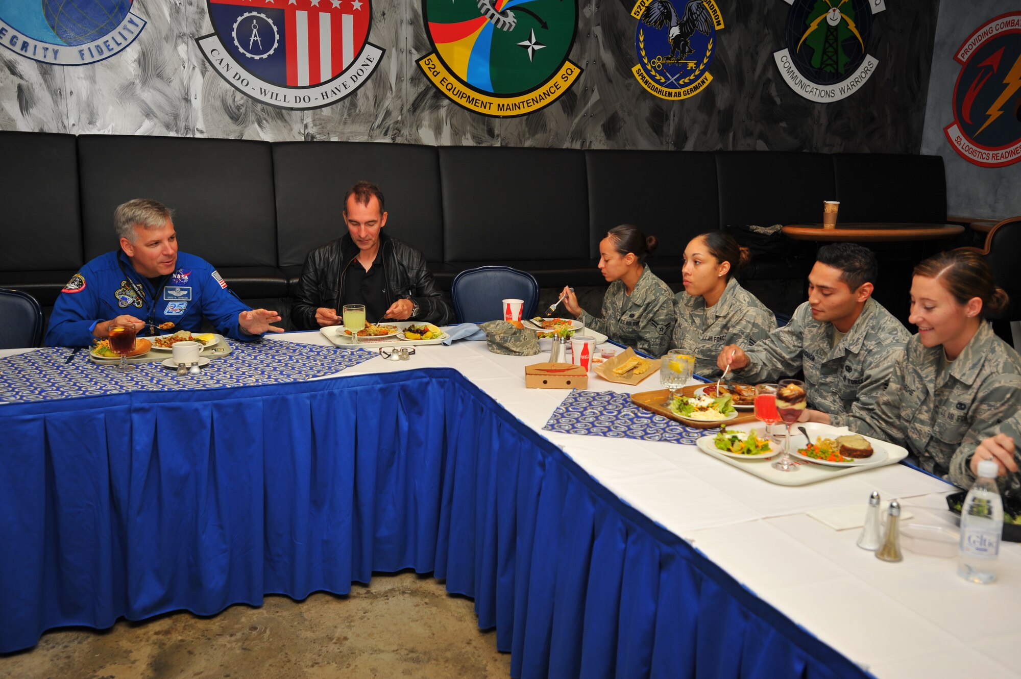 SPANGDAHLEM AIR BASE, Germany – Retired U.S. Air Force Col. Gregory “Box” Johnson, left, NASA STS-134 Endeavour pilot, answers questions about the NASA space program during a meet and greet lunch with Airmen inside Club Eifel here Sept. 14. The NASA astronaut tour visits all Air Force bases in Europe and is intended to give Airmen insight on making the jump from the military to the space program. (U.S. Air Force photo/Airman 1st Class Dillon Davis)