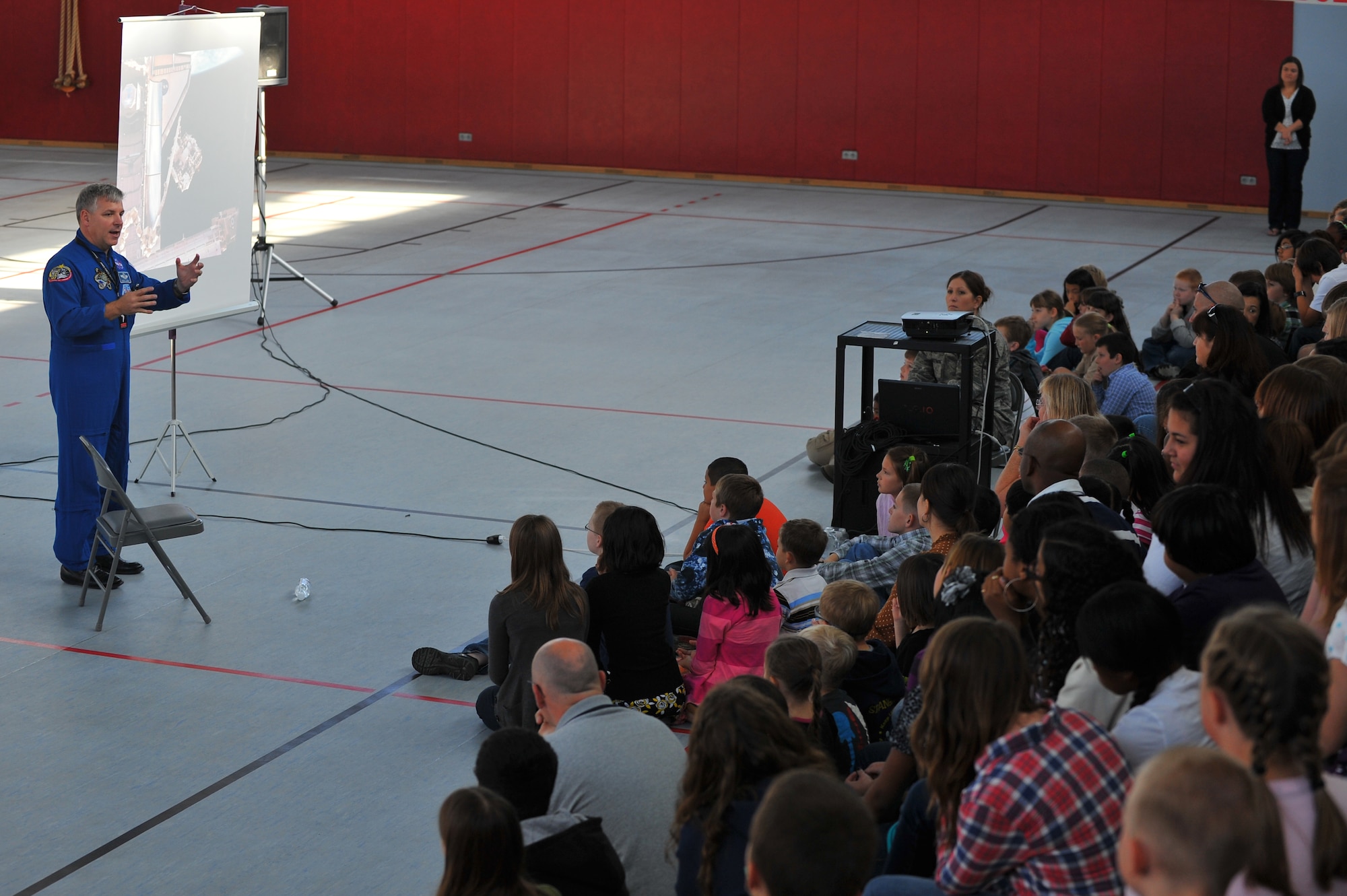 SPANGDAHLEM AIR BASE, Germany – Retired U.S. Air Force Col. Gregory “Box” Johnson, NASA STS-134 Endeavour pilot, talks about his experiences in the NASA space program to children at Spangdahlem Air Base Middle School during a tour here Sept. 14. The NASA astronaut tour visits all Air Force bases in Europe and is intended to give Airmen insight on making the jump from the military to the space program. (U.S. Air Force photo/Airman 1st Class Dillon Davis)