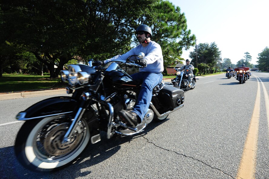 Airmen and civilians begin a POW/MIA remembrance motorcycle ride from Seymour Johnson Air Force Base, N.C., to Bentonville Battlefields, Sept. 14, 2011. The Air Force Sergeants Association, Chapter 371, is hosting several events on base from Sept. 12-16 to honor Americans held as prisoner of war and to renew our nation?s commitment to account for U.S. personnel still missing from the nation?s past wars and conflicts. Events range from this motorcycle ride to a 24-hour remembrance run Sept. 15, which will lead into the National POW/MIA Recognition Day ceremony here Sept. 16. (U.S. Air Force photo by Airman 1st Class Mariah Tolbert)
