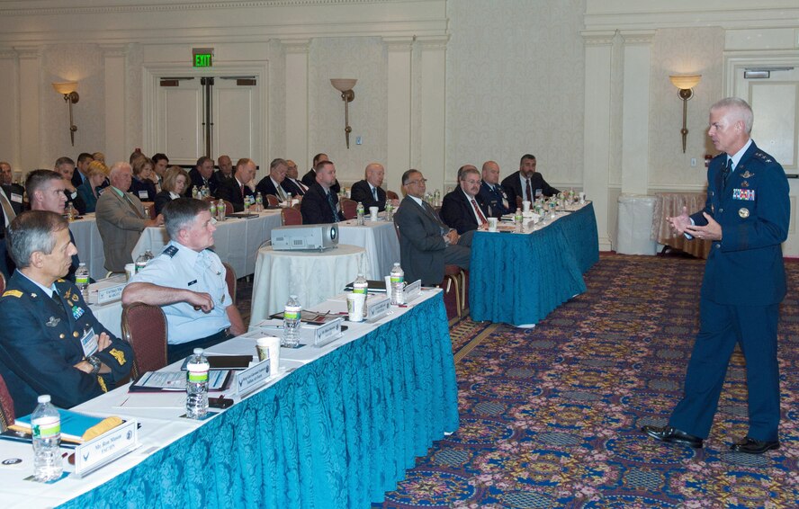 Electronic Systems Center Commander Lt. Gen. Charles (C.R.) Davis addresses attendees at the ninth annual Net-Centric Conference at the Marriott Wentworth By the Sea Resort in New Castle, N.H., Sept. 12.  Looking on in the front row are Italian Air Force Brig. Gen. Giovanni Fantuzzi (left) and Lt. Gen. William Lord, the Air Force’s chief information officer and chief of Warfighting Integration.  General Fantuzzi, General Lord and many others also spoke during the day-long conference.  (U.S. Air Force Photo by Rick Berry)