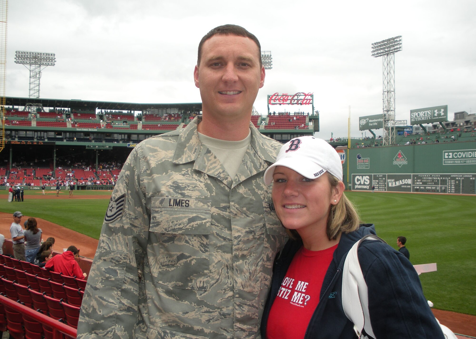 BOSTON – Tech. Sgt. Andrew Limes, 66th Security Forces Squadron’s Military Working Dogs section kennel master, and his fiancée, Lauren Joyce, take in a Red Sox game at Fenway Park. The couple met on the Green Monster four years ago and is now competing for “A Wedding to Remember.” (Courtesy photo)