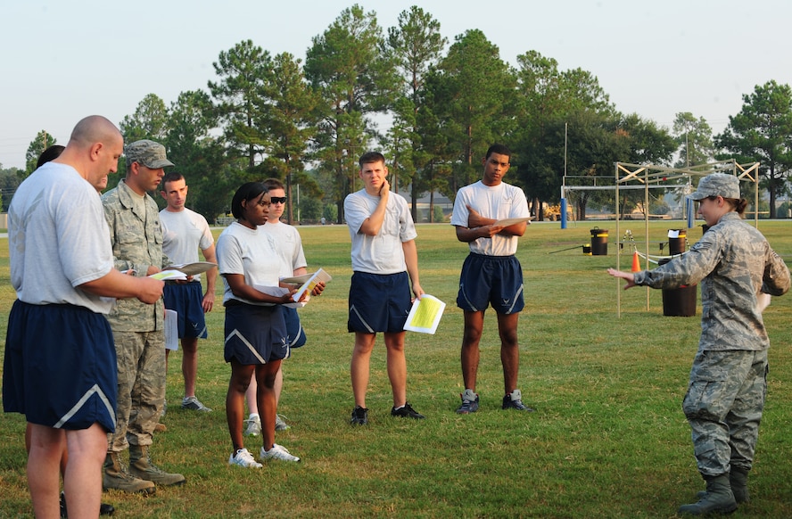 U.S. Air Force Staff Sgt. Elizabeth Powers, 23rd Civil Engineer Squadron readiness and emergency management, briefs the contamination control area attendants on their role during decontamination procedures at Moody Air Force Base, Ga., Sept. 14, 2011. This training will prepare them for the operational readiness inspection early next year. (U.S. Air Force photo by Senior Airman Stephanie Mancha/Released)