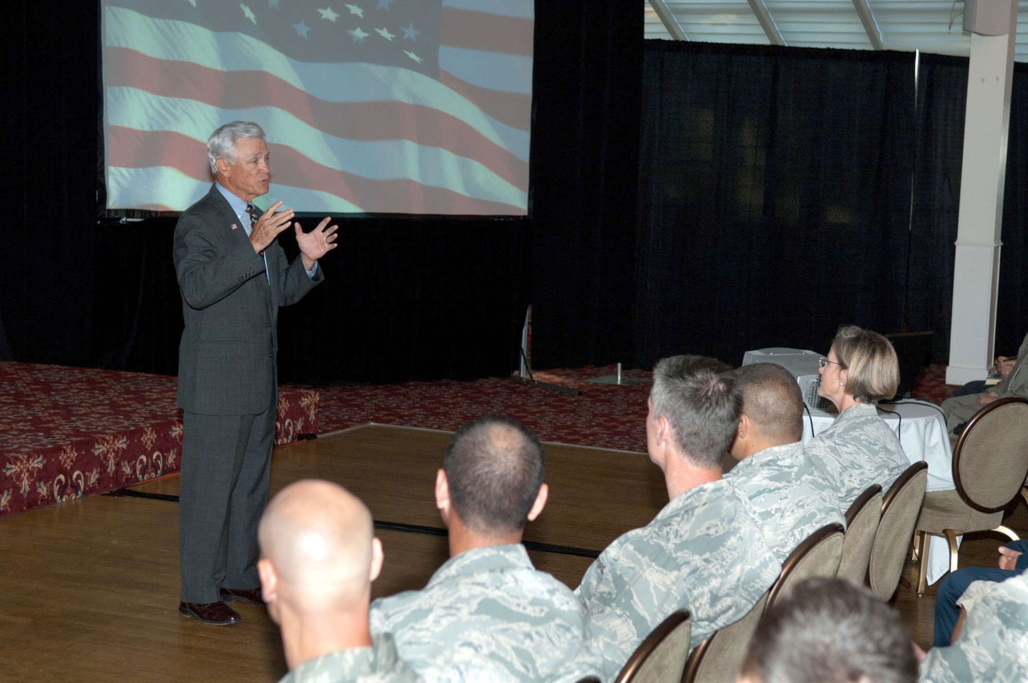 HANSCOM AIR FORCE BASE, Mass. – Retired Lt. Col. Barry Bridger speaks to a large crowd in the Hanscom Ballroom of the Minuteman Commons Sept. 9 as part of the Heritage of Freedom speaker series. Colonel Bridger spoke about his treatment as a prisoner of war at the “Hanoi Hilton” and also offered advice to today’s Airmen. (U.S. Air Force photo by Rick Berry)
