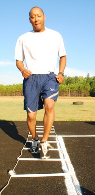 Fit camp participant Christopher A. Johnson from the 94th Aeromedical Staging Squadron, completes the agility ladders during circuit training held Sept. 14. The gauntlet circuit training consisted of various exercises strengthning overall agility, resistance and balance abilities. (U.S. Air Force photo/Airman 1st Class Chelsea Smith)