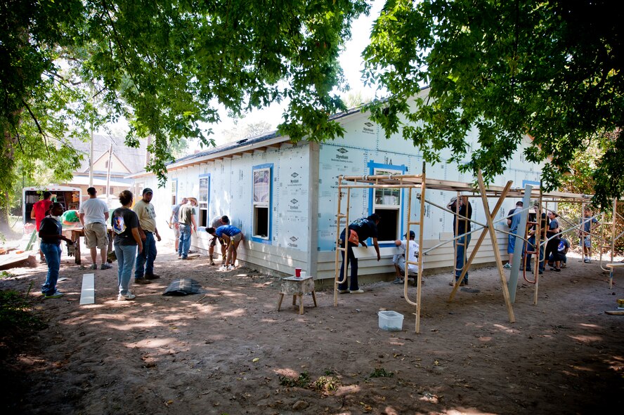 Volunteers from Valdosta Ga., and Moody Air Force Base Ga., continue to work on a house for Habitat for Humanity on Sept. 13, 2011. The Habitat for Humanity is an organization consisting of volunteers that is building a home for Tim and Miranda Mabry and their three children, Madeline, Lillian and Jacob. Tim’s mother, Carol Cooper will also stay in the home. (U.S. Air Force photo by Staff Sgt. Joshua J. Garcia/Released)