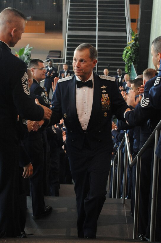 U.S. Air Force Gen. William Fraser III, commander of Air Combat Command, greets Airmen at the ACC Order of the Sword ceremony in Hampton, Va., Sept. 12, 2011. Fraser served as the commander of ACC, which operates more than 1,000 aircraft, 22 wings, 13 bases, and more than 300 operating locations worldwide with 79,000 active-duty and civilian personnel. U.S. Air Force photo by Airman 1st Class Racheal Watson/Released)