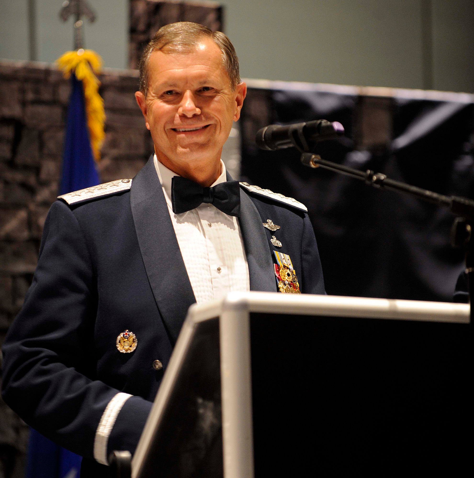 U.S. Air Force Gen. William M. Fraser III commander of Air Combat Command, addresses a crowd of approximately 500 Airmen from across ACC during the Order of the Sword CeremonySept. 12, 2011, in Hampton, Va. Fraser was presented the Order of the Sword by enlisted Airmen for his abilities to care for and prepare Airmen to meet the nation?s demands. (U.S. Air Force photo by Staff Sgt. Dana Hill/Released)