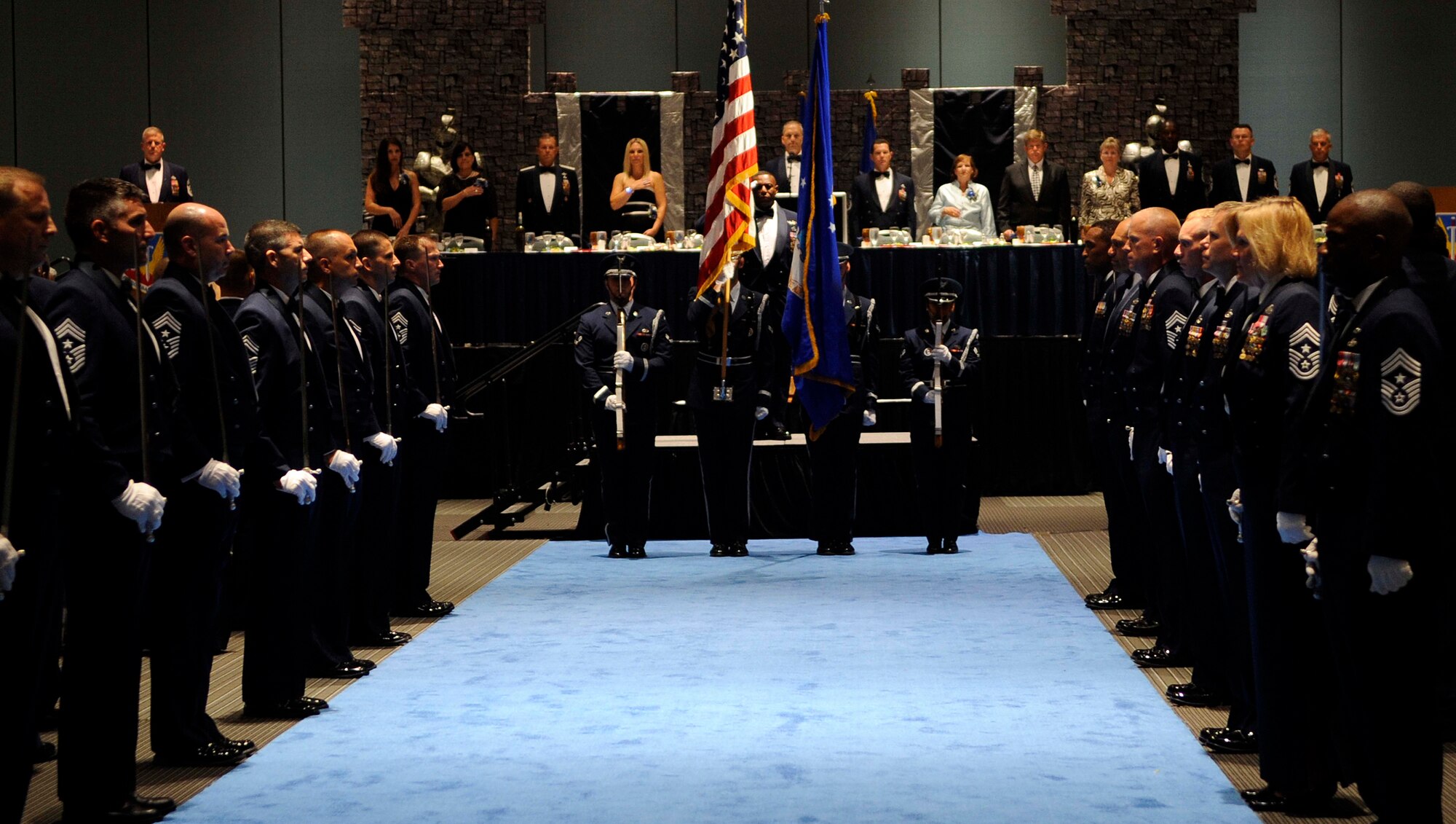 Members of the Langley Air Force Base Honor Guard post the colors during the Order of the Sword Ceremony Sept. 12, 2011, in Hampton, Va.  The Order of the Sword is the highest honor the enlisted force can bestow upon a leader. (U.S. Air Force photo by Staff Sgt. Dana Hill/Released)
