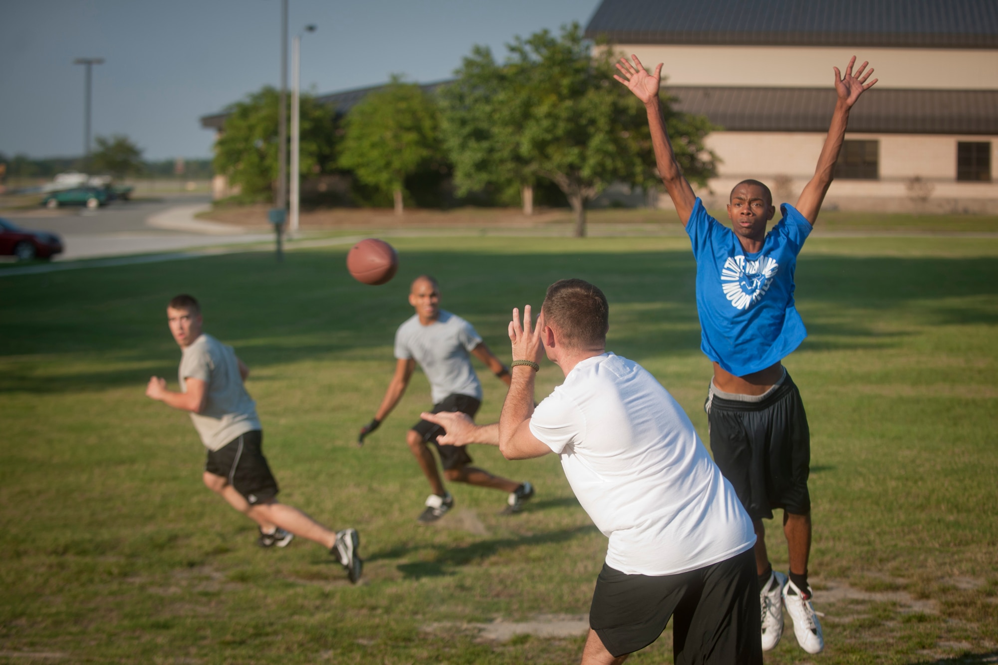 The 23rd Wing Staff intramural football team runs passing and defensive drills during practice at Moody Air Force Base, Ga., Sept. 13, 2011. The team is preparing for the beginning of the flag football season starting the first week of Oct. (U.S. Air Force photo by Airman 1st Class Joshua Green/Released)
