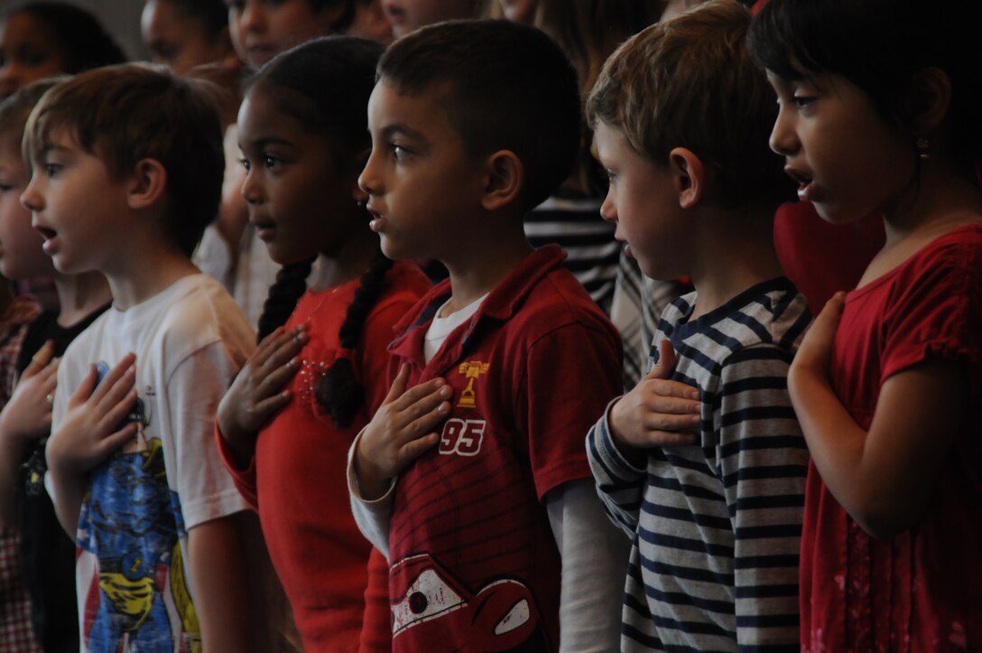 RAF CROUGHTON, United Kingdom - Children from Croughton Elementary School sing during a 9/11 memorial service at the chapel Sept. 9. (U.S. Air Force photo by Senior Airman Joel Mease)