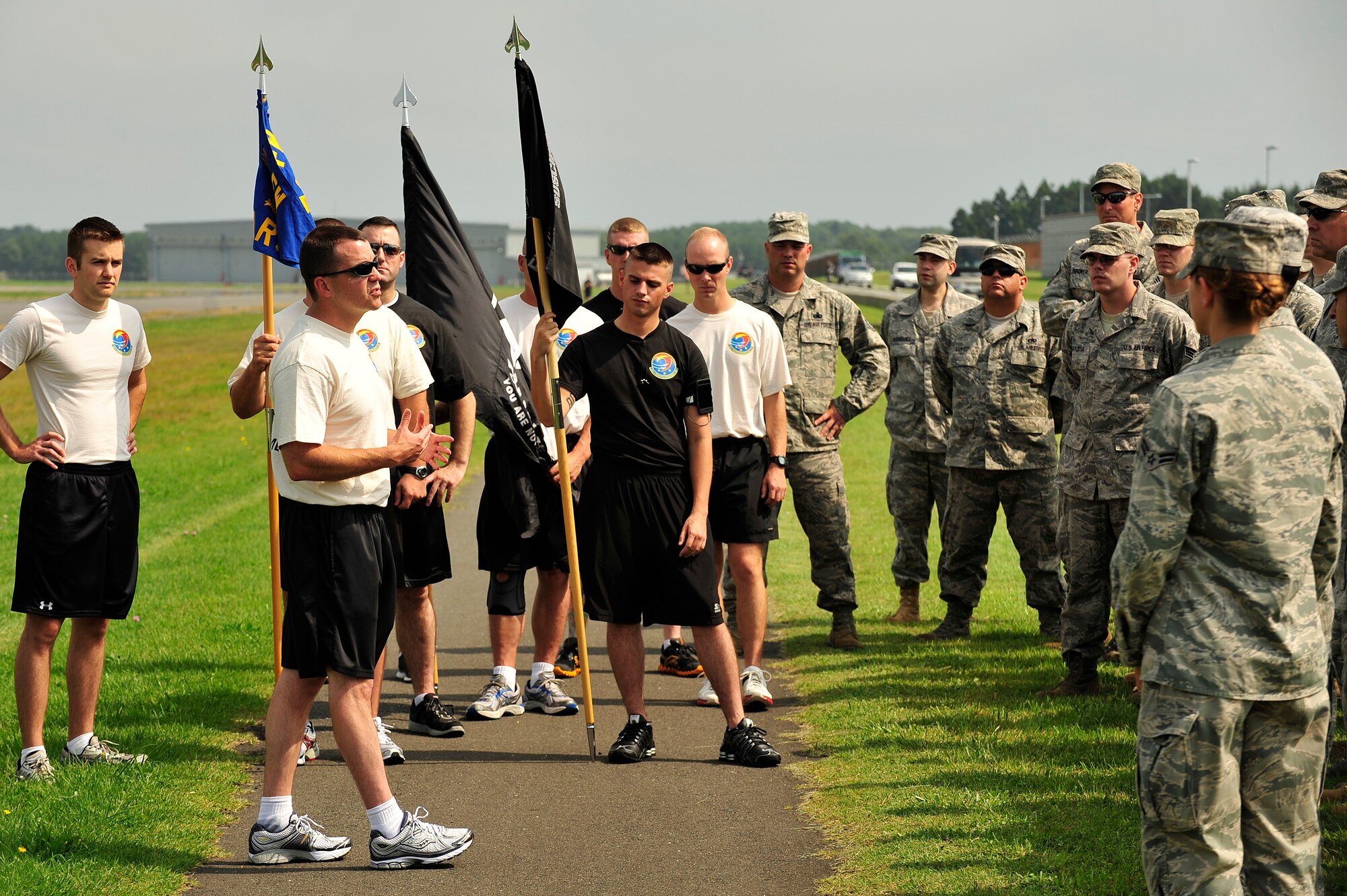 MISAWA AIR BASE, Japan - Maj. Andrew Pate, 35th Logistics Readiness Squadron commander, addresses those gathered to honor the sacrifice of all Prisoners Of War and those Missing in Action, Sept. 15. Members of the squadron will run the perimeter of the base for 24 hours in remembrance of prior service members who have gone missing in combat and endured enemy prison camps as part of their sacrifice. (U.S. Air Force photo/Staff Sgt. Nathan Lipscomb)