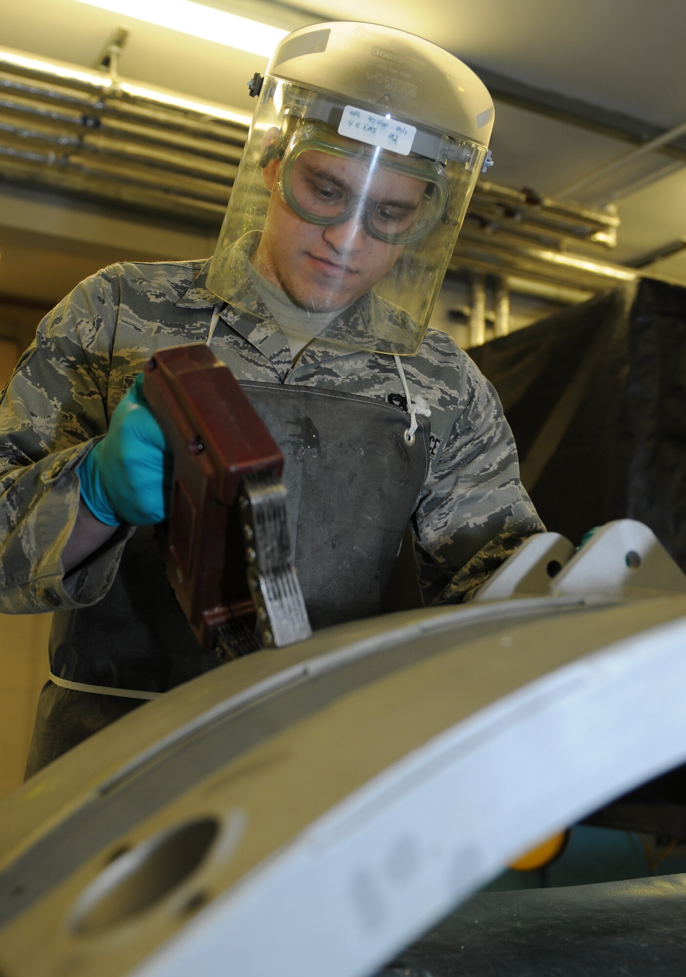 ROYAL AIR FORCE LAKENHEATH, England - Airman 1st Class Mark Renz, 48th Equipment Maintenance Squadron nondestructive inspection journeyman, checks equipment for faults on Sept. 14, 2011. Renz was nominated for a Liberty Spotlight because he displays the core value of "Excellence in All We Do". (U.S. Air Force photo by Airman Cory Payne) 
