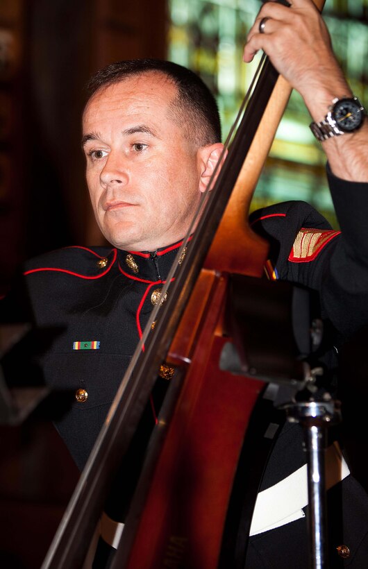 Staff Sgt. Charles Harbison, a bass player for the U.S. Marine Corps Forces, Pacific Band, plays at a concert held at Old St. Paul's here Sept. 16 as part of a recently-begun yearlong celebration of the 70th anniversary of the Marines landing in Wellington in 1942. Old St. Paul's is a cathedral Marines commonly attended while stationed here in World War II.