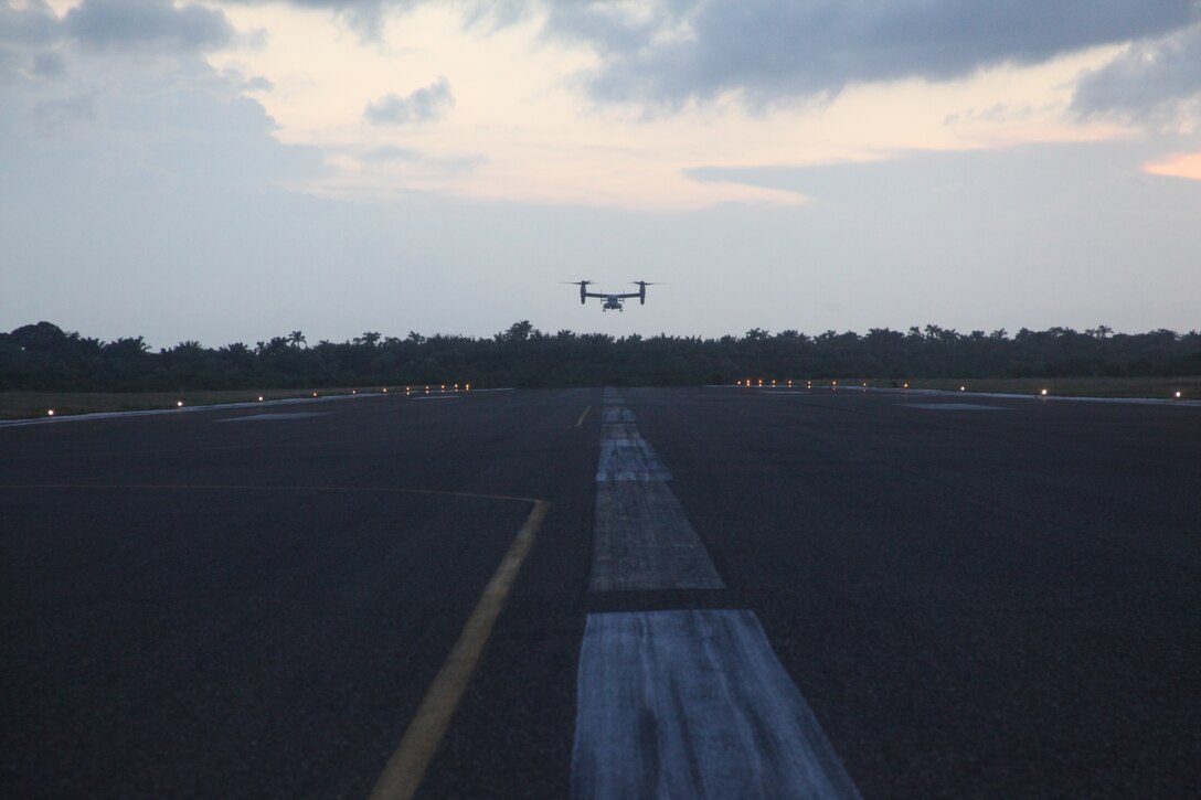 An MV-22 Osprey comes in for a landing at Philip S. W. Goldson International Airport in Belize, Sept. 16, 2011.