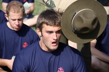 Staff Sgt. Luis C. Cardenas, drill instructor, Company L, 3rd Recruit Training Battalion, Marine Corps Recruit Depot San Diego, corrects a member of the delayed entry program from Recruiting Station Indianapolis Sept. 17. Members of of the DEP are often referred to as poolees.