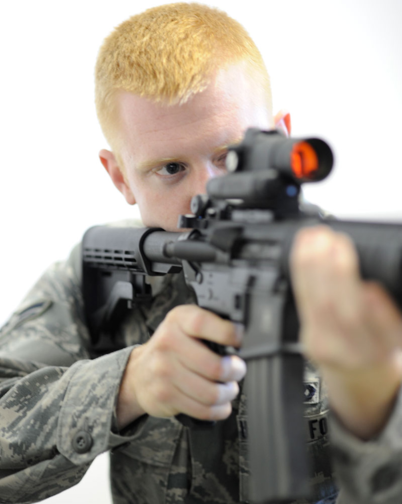 Airman 1st Class Charles Barger, 3rd Aircraft Maintenance Squadron, lines up a shot at the CATM facility, Sept. 8.  (U.S. Air Force photo/Steve White)