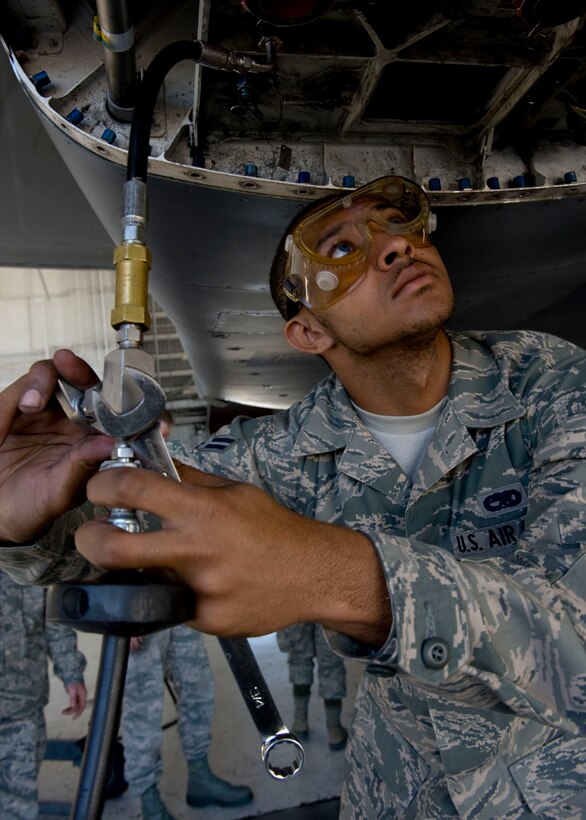 Airman 1st Class Christopher Love, 28th Aircraft Maintenance Squadron crew chief, services a B-1B Lancer with gaseous nitrogen keeping it ready to fly on Ellsworth Air Force Base, S.D., Sept. 8, 2011. Love was receiving B-1 specific training to prepare him to compete in the Global Strike Challenge. Operations, bomber and security forces teams from bomber and missile wings compete in the challenge to showcase their expertise, skill and capabilities. (U.S. Air Force photo by Airman 1st Class Kate Thornton/Released)