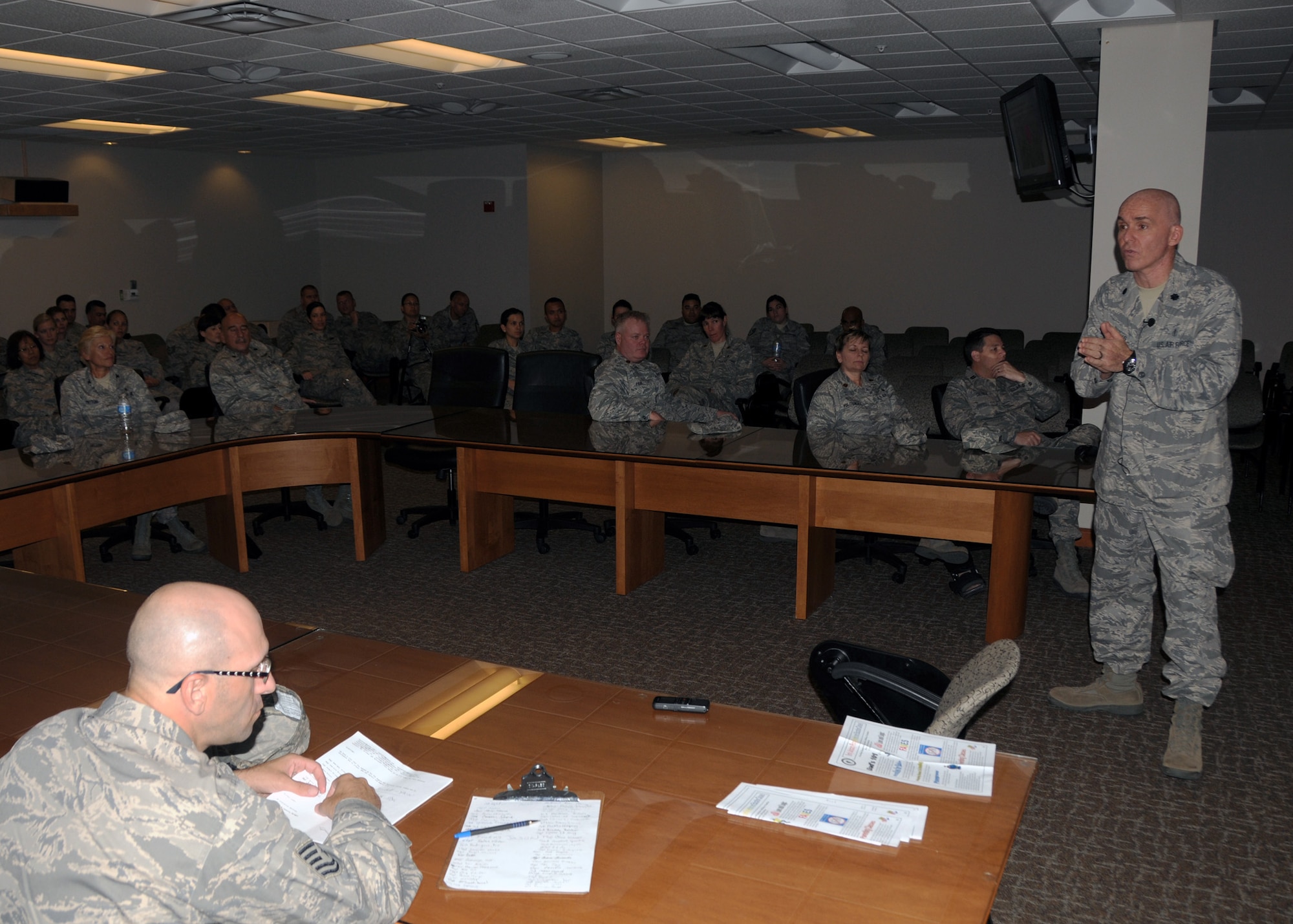 Lt Col Marc R. Matthews, 161st Medical Group Surgeon, briefs 944th Fighter Wing Aeromedical Staging Squadron  and 944th Medical Squadron airmen,  Sep 10 at the 56th Medical Group  conference room Luke Air Force Base, Arizona.  (U.S. Air Force photo/Staff Sgt. Louis Vega Jr.)