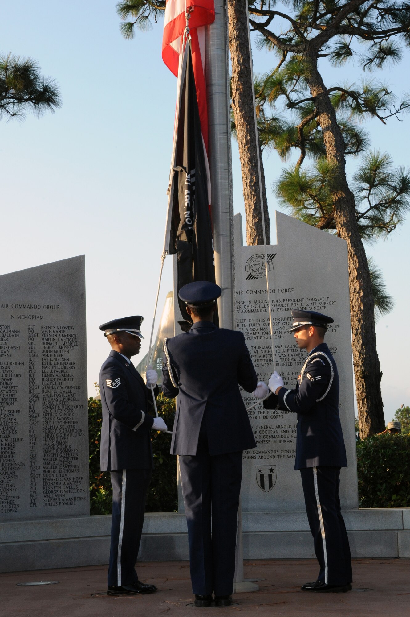 The Hurlburt Field Honor Guard raises the prisoner of war and missing in action flag during the ceremony, at Hurlburt Field, Fla.  Sept. 16, 2011, Colonel Ted Fordyce, vice commander of the 1st Special Operations Wing, memorialized the special operation forces during National POW/MIA Recognition Day .(U.S. Air Force photo/Senior Airman Eboni Reams)(Released)