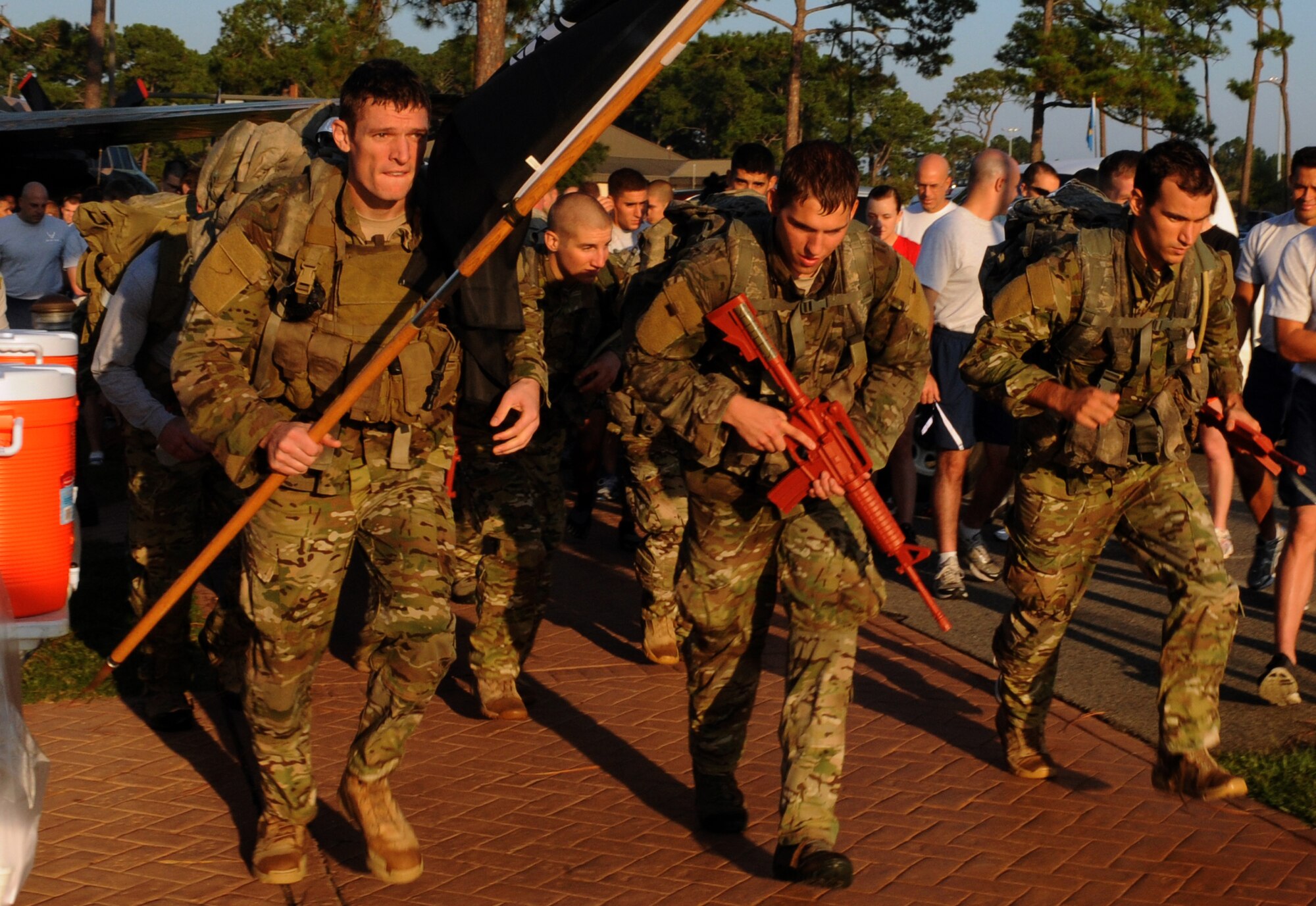 Tactical Air Control Party students lead the charge during the of prisoner of war and missing in action 5K run, on Hurlburt Field, Fla., Sept. 16, 2011. (U.S. Air Force photo/Senior Airman Eboni Reams)(Released)